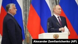Прем’єр-міністр Угорщини Віктор Орбан (л) підтримує регулярні контакти з російським лідером Володимиром Путіним, фото ілюстративне