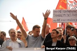 Олексій Навальний разом із Гаррі Каспаровим (ліворуч) і Іллею Яшиним (праворуч) під час «Маршу мільйонів». Москва, Росія. 6 травня 2012 року