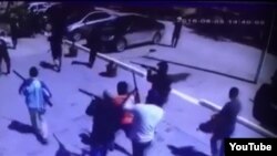 На кадре из видео — предполагаемые боевики в городе Актобе 5 июня 2016 года.