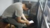 Патрульний поліцейський Іван Приходько, якого підозрюють у вбивстві 5-річного хлопчика. Засідання Голосіївського райсуду Києва, 4 червня 2019 року