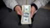 آیا دولت ایران می‌تواند ​دلار را از مبادلات بازرگانی حذف کند؟