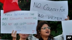 An Activist of Awami Workers Party chants slogans during a demonstration to condemn the killing of model Qandeel Baloch and against honor killing, in Islamabad, Pakistan, July 2016. 