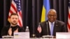 Ukrainian President Volodymyr Zelensky (left) and U.S. Defense Secretary Lloyd Austin attend the opening of the Ukraine Defense Contact Group meeting at Germany's Ramstein Air Base on January 9.