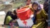 Afghan refugees deported from Pakistan arrive with their belongings at a makeshift camp near the Afghanistan-Pakistan border in Torkham, Nangarhar Province, on April 7.