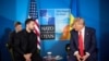 In this handout photograph taken and released by the Ukrainian Presidential Press Service on June 25, 2025, Ukraine's President Volodymyr Zelensky (L) meets with US President Donald Trump on the sideline of the North Atlantic Treaty Organization (NATO) summit in The Hague. 
