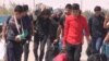 As Iran's Economy Suffers, Afghan Migrants Forced To Go Home